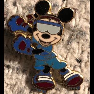 Disney trading pin. Mickey on rollerblades